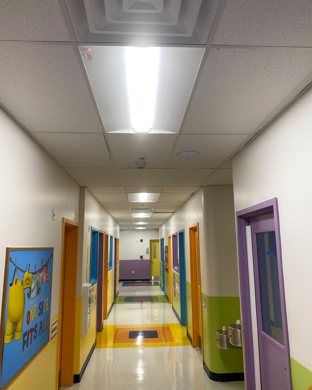 Hallway lighting in a completed commercial facility